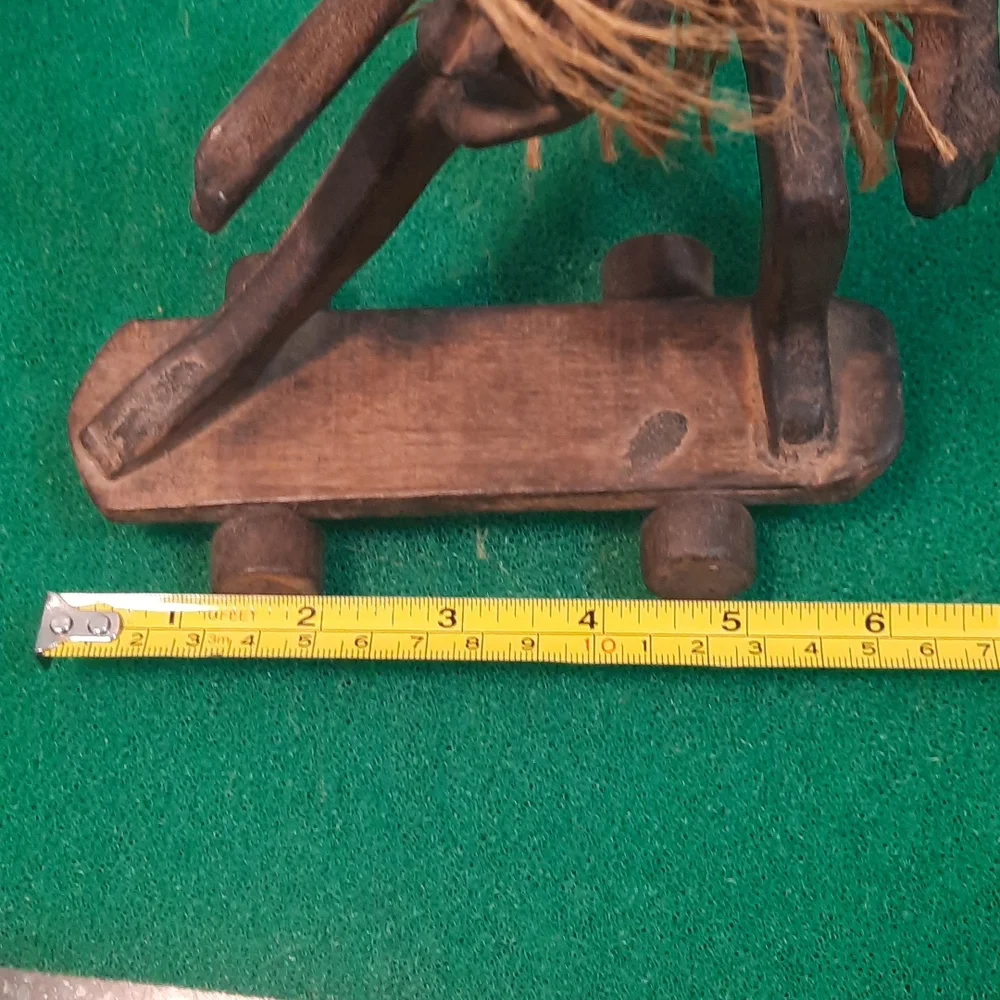 Hand carved wooden Hawaiian Tiki skateboard dude